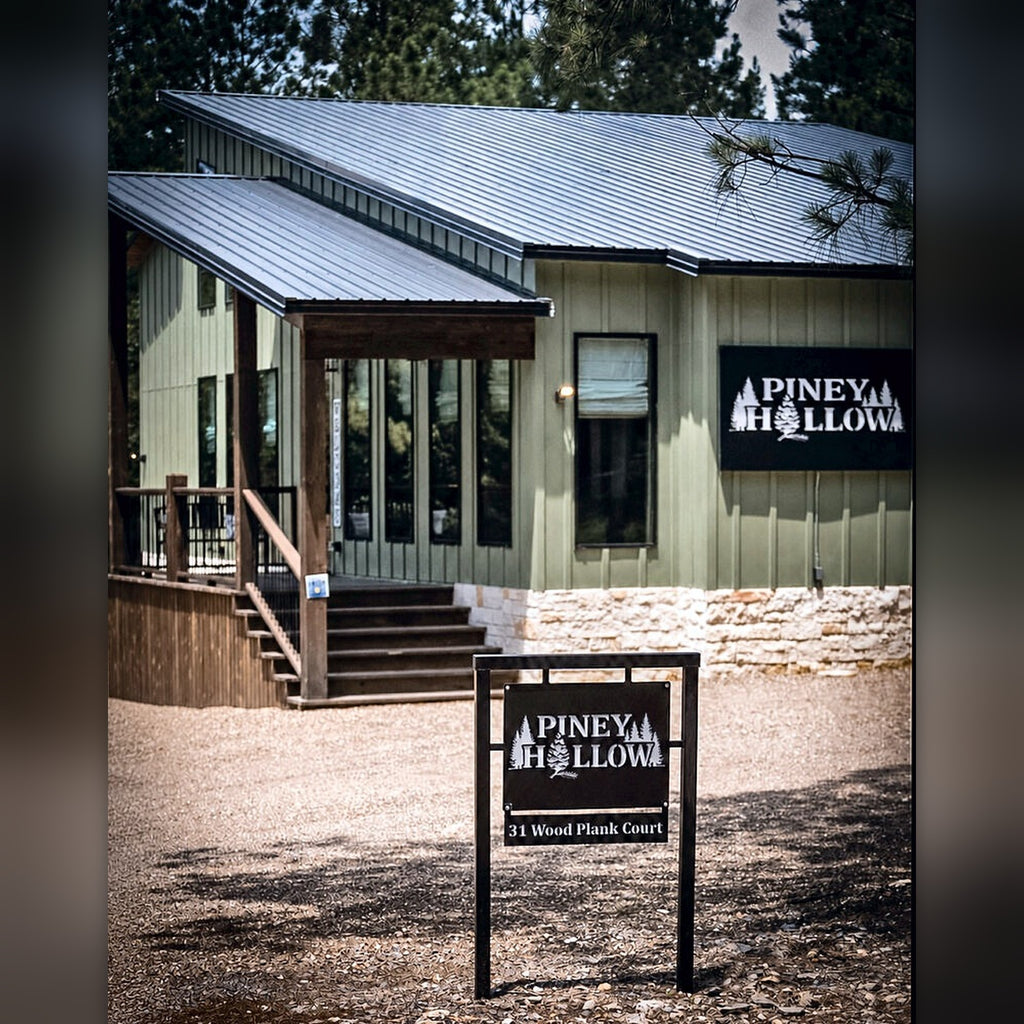 Piney Hollow cabin road sign installed, Broken Bow area