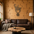Buck & Doe Heart Metal Wall Art in bronze, shown in a cabin living room