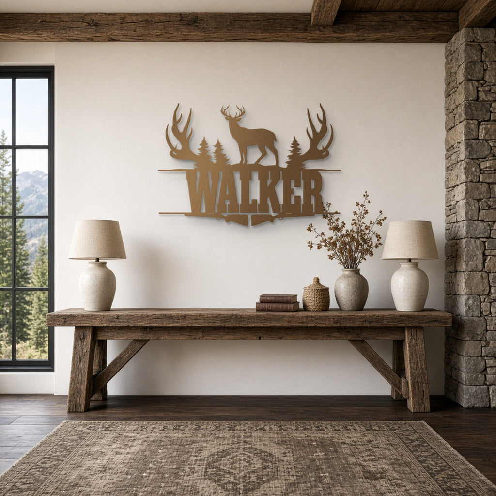 Deer Hunter Name Sign: Antlers, Pines & Rifles in bronze, shown in a mountain lodge living room