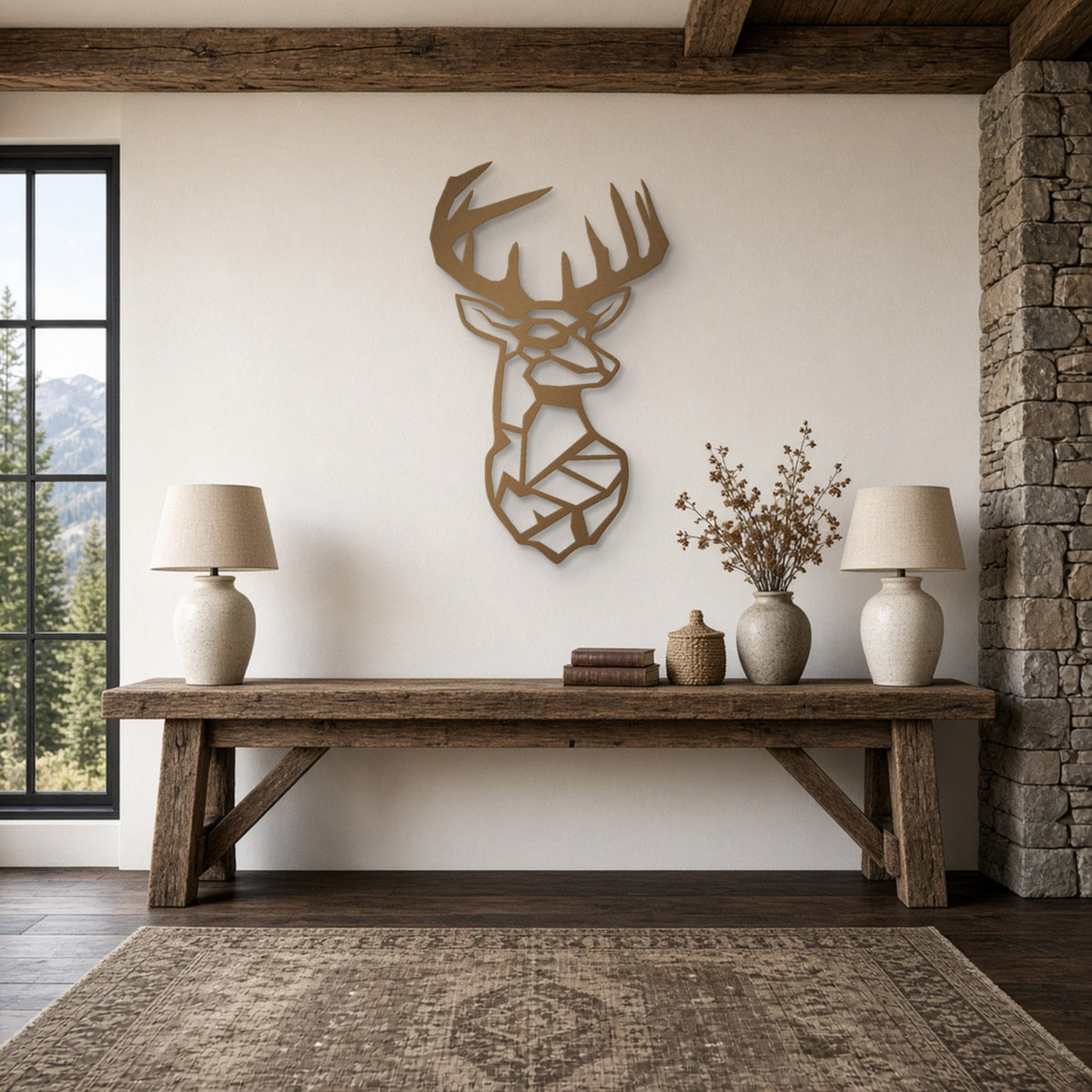 Geometric Buck Head Metal Wall Art in bronze, shown in a mountain lodge living room