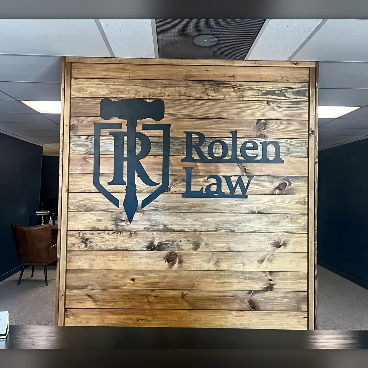 Rolen Law office lobby logo sign
