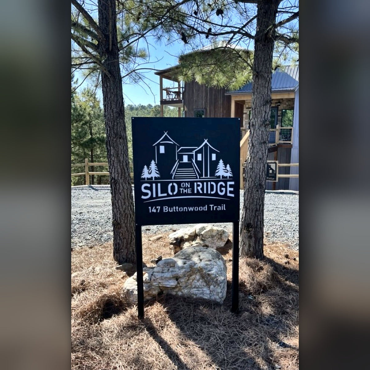 Silo on the Ridge cabin rental steel frame sign