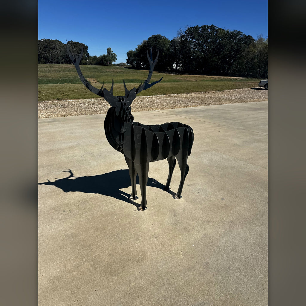 Steel elk sculpture with full antlers