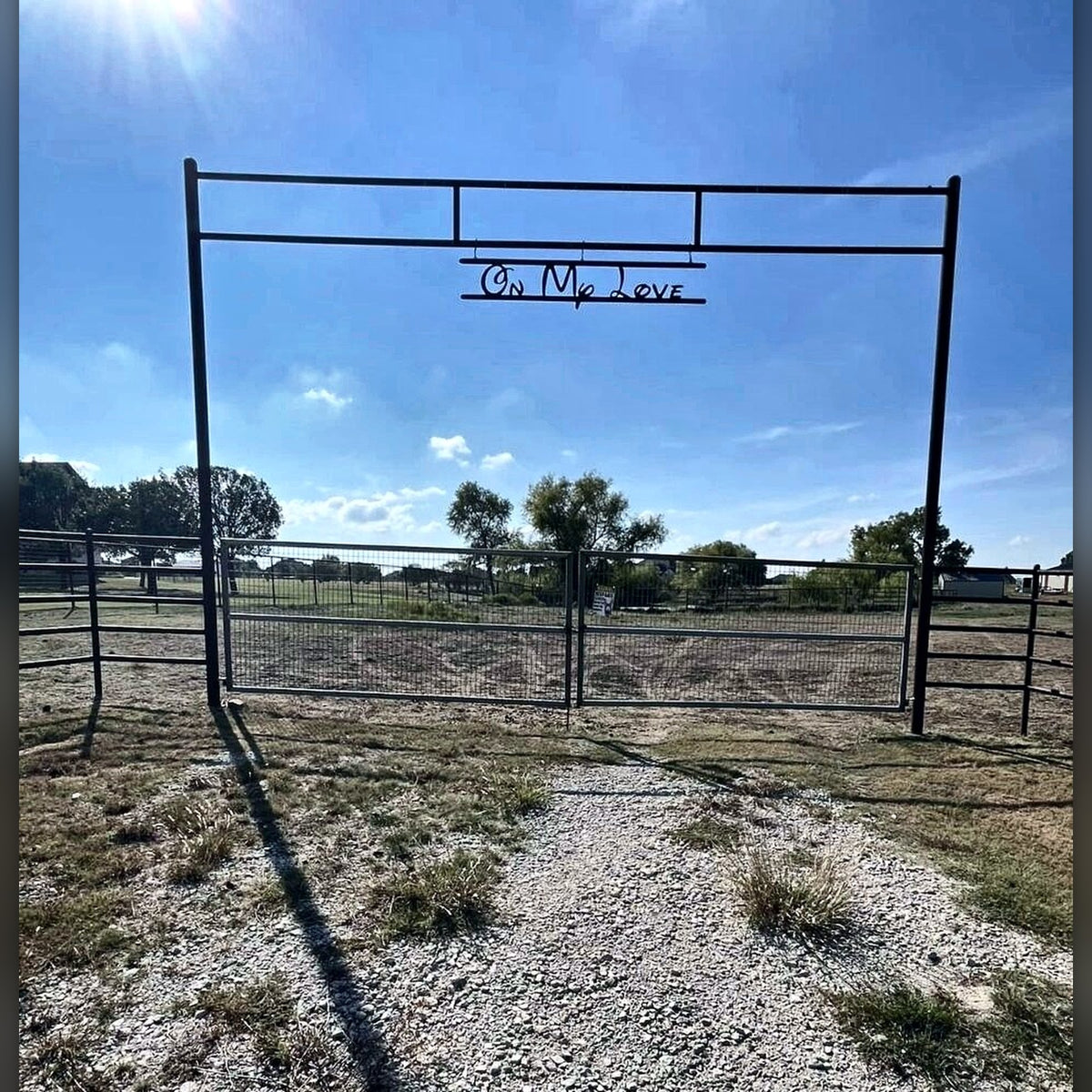 Ranch entrance arch with cut lettering