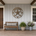 Texas Star Welcome Metal Sign in bronze, shown in a covered front porch